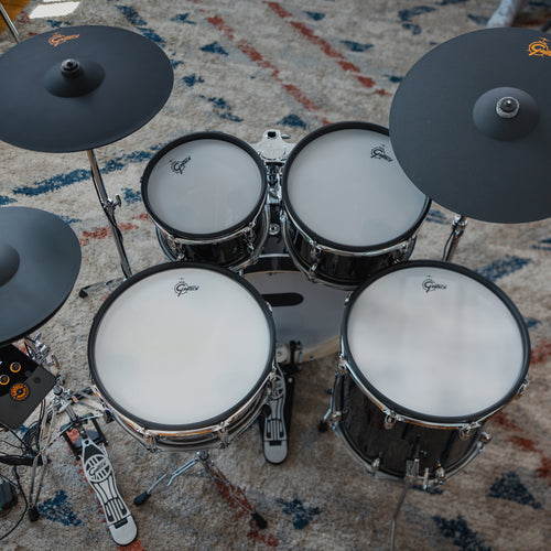 Overhead view of Gretsch Catalina EVO Black Sparkle electronic drum kit with cymbals and module