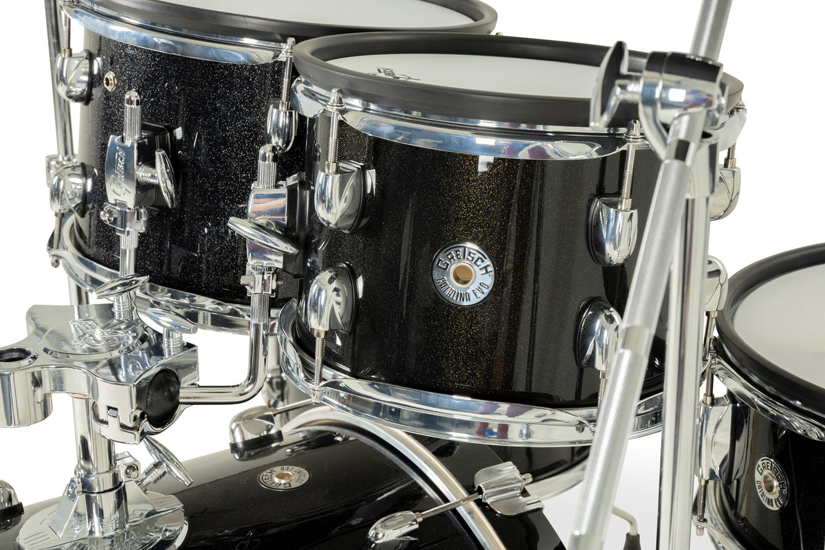 Close-up of Gretsch Catalina EVO Black Sparkle rack toms with chrome hardware and badge