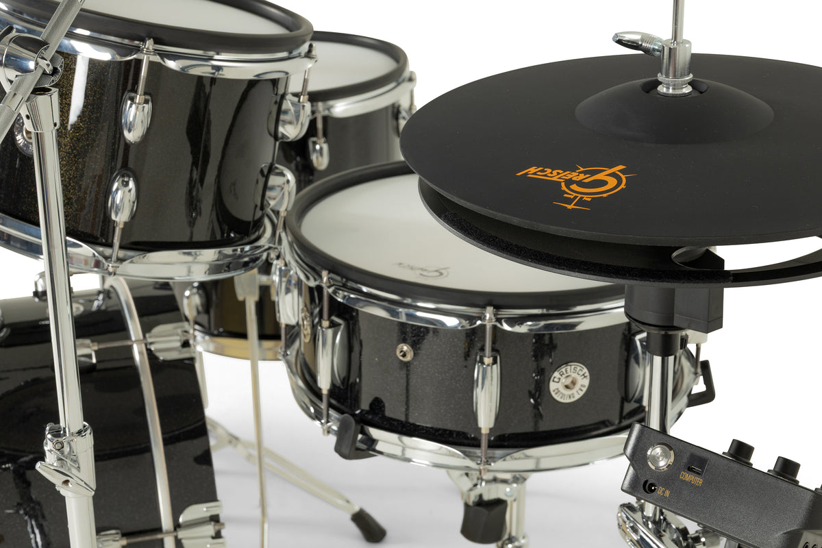 Gretsch Catalina EVO hi-hat over Black Sparkle snare pad, with drum module USB-C and DC inputs