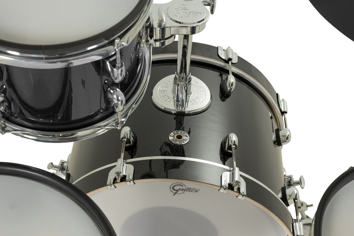 Close-up of Gretsch Catalina EVO Black Sparkle bass drum with chrome tom mount base