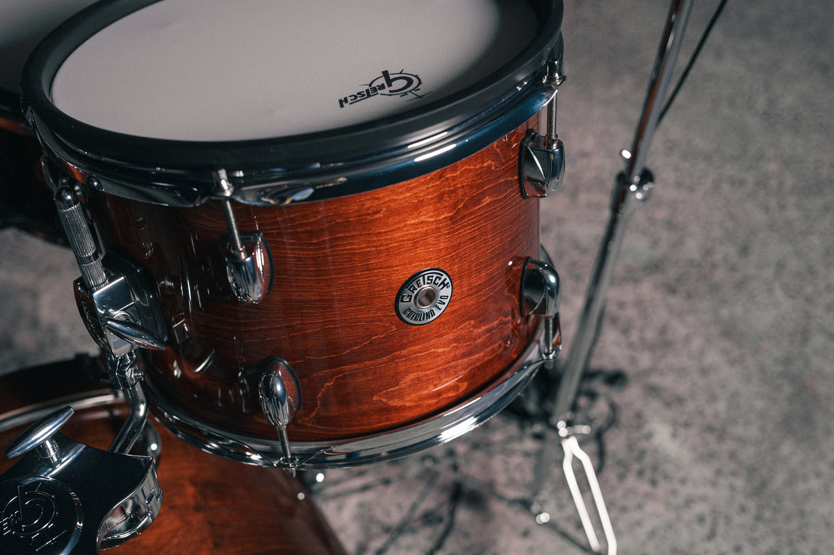 Overhead close-up of Gretsch Catalina EVO Walnut Glaze rack tom with mesh head