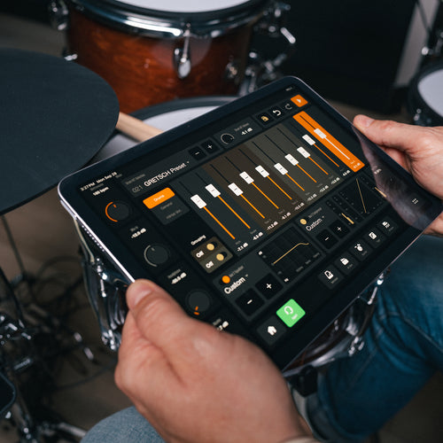 Gretsch E-Drum Remote app mixer screen on a tablet beside the Catalina EVO kit
