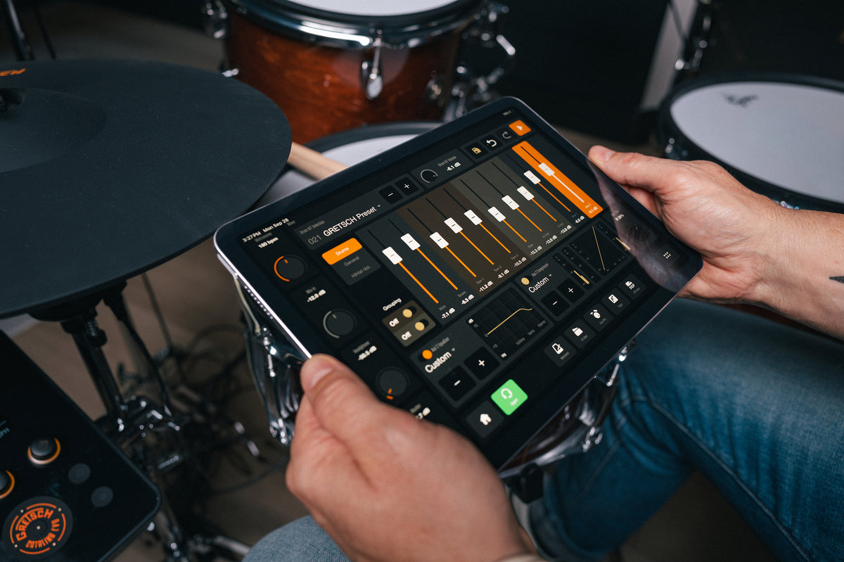 Gretsch E-Drum Remote app mixer screen on a tablet beside the Catalina EVO kit