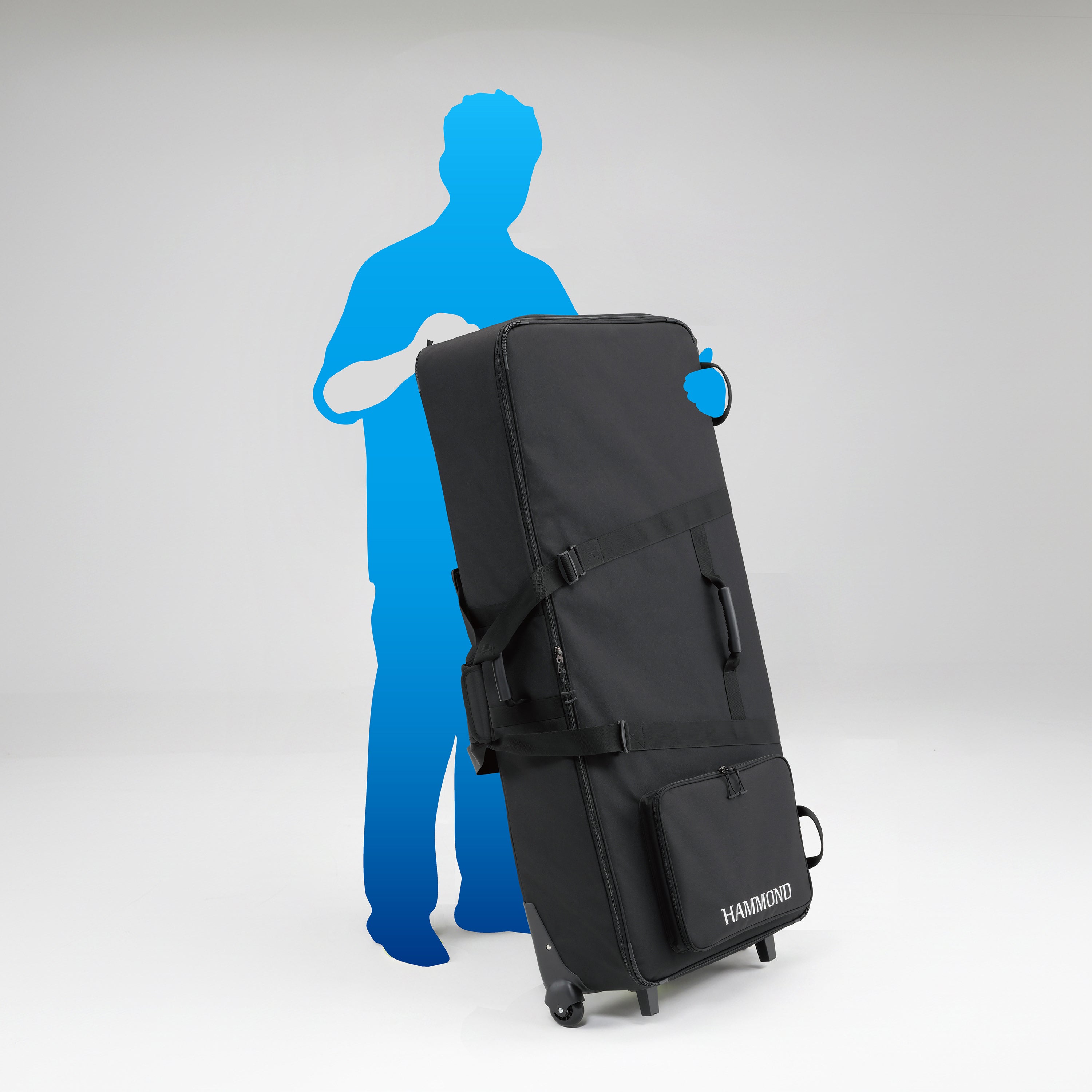 Hammond SCC-XKD Gig Bag shown next to an average height person, the bag when wheeled comes up to the persons chest