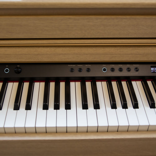 Roland HP704 Digital Piano - Light Oak controls to the left of center screen