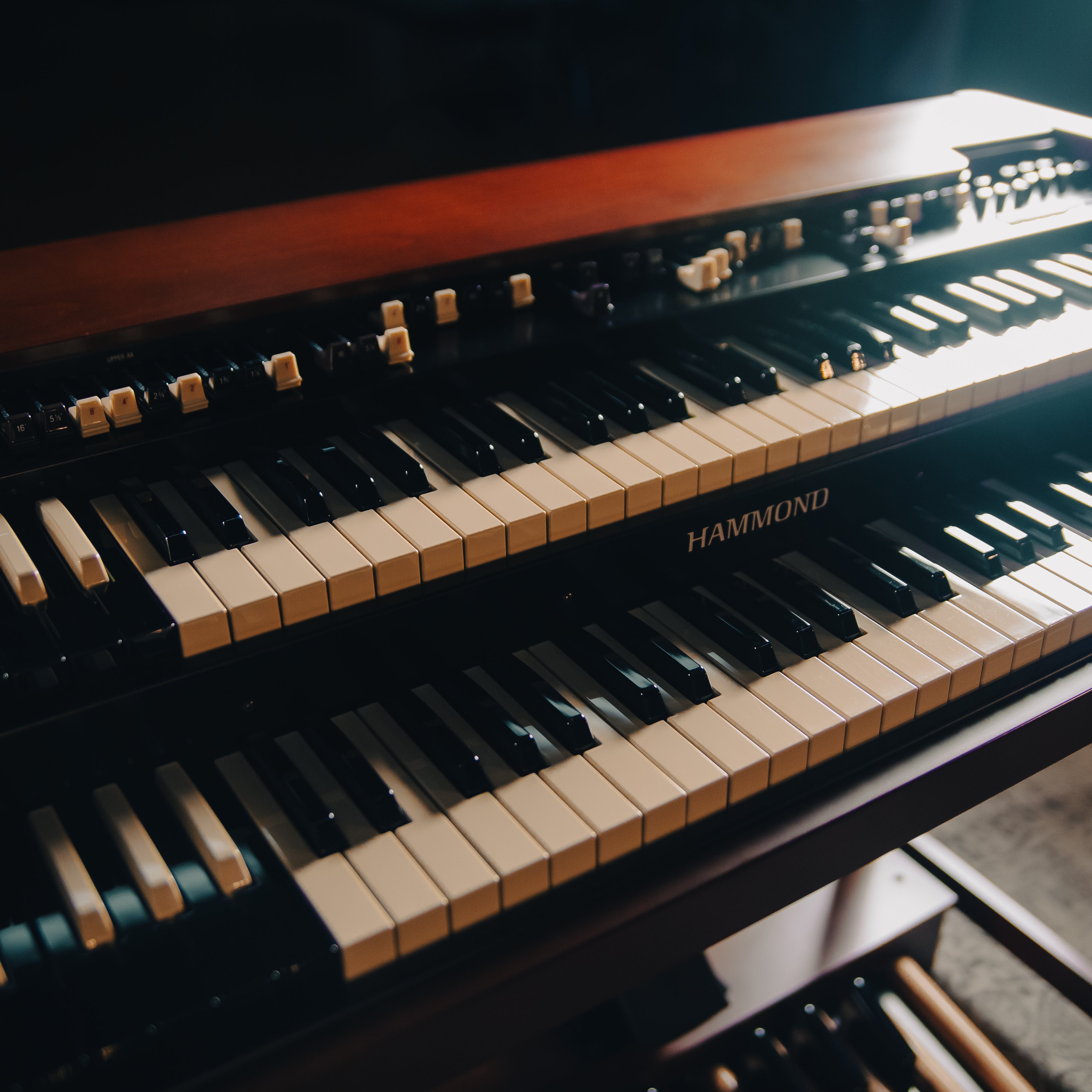 Hammond XK-7D Classic Ultimate Dual-Manual Tonewheel Organ System, photographed in warm low light.