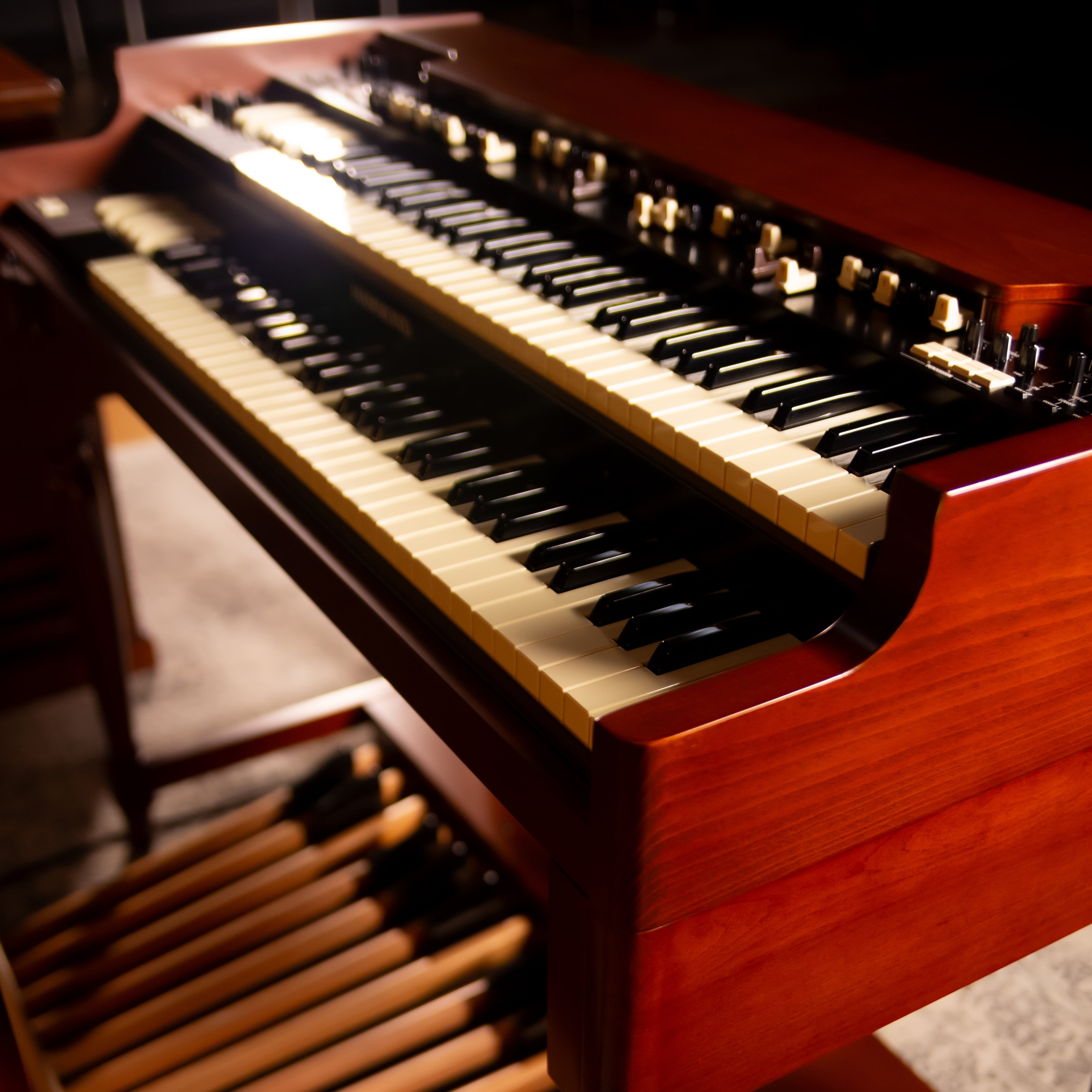 Hammond XK-7D Classic Ultimate Dual-Manual Tonewheel Organ System, photographed in warm indoor lighting.