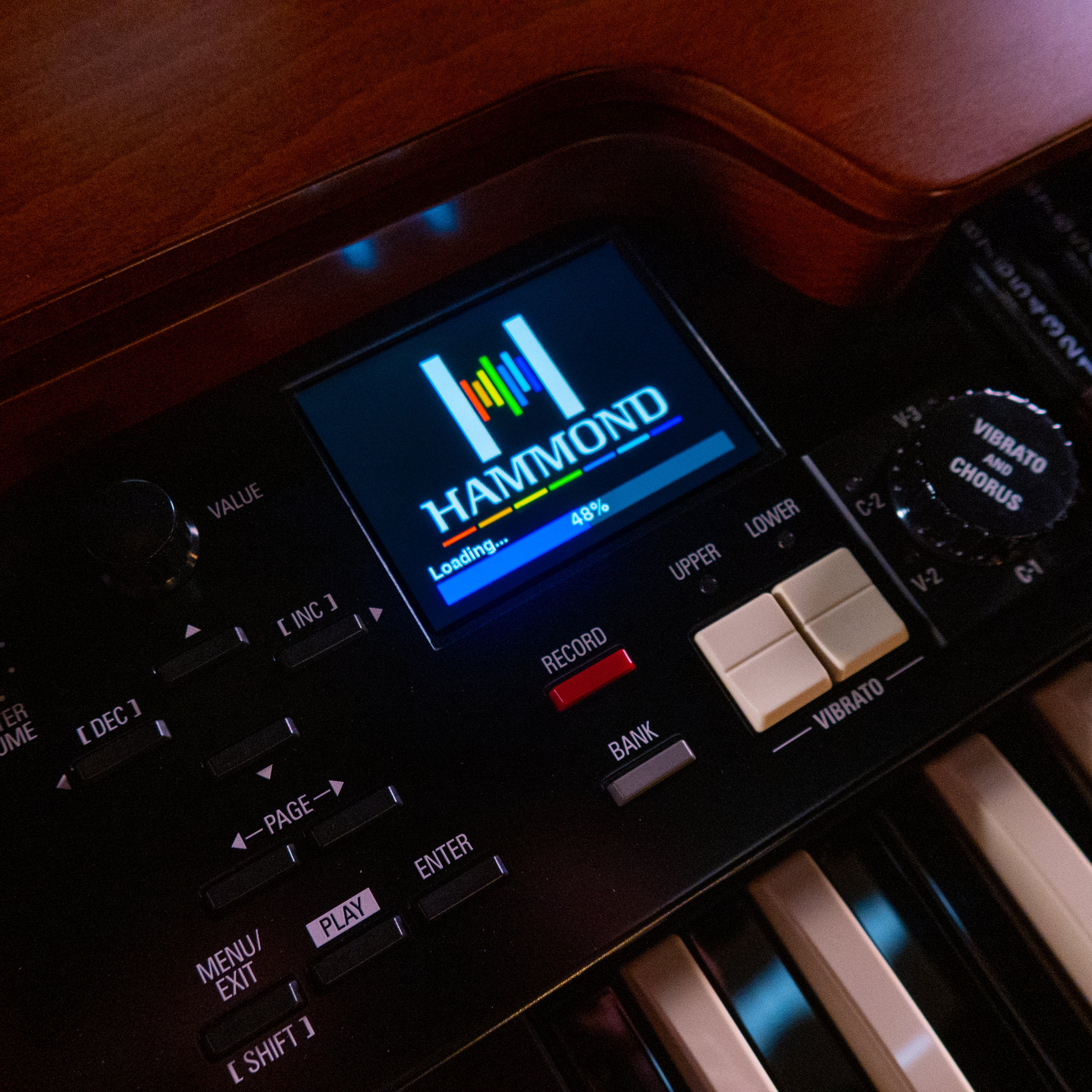 Close-up of the Hammond XK-7D Classic Ultimate Dual-Manual Tonewheel Organ showing the brand logo on its screen