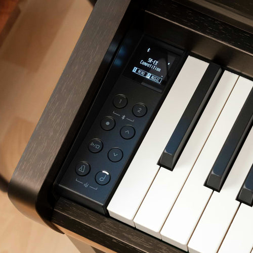 A rosewood Kawai CA401 Concert Artist digital piano control panel