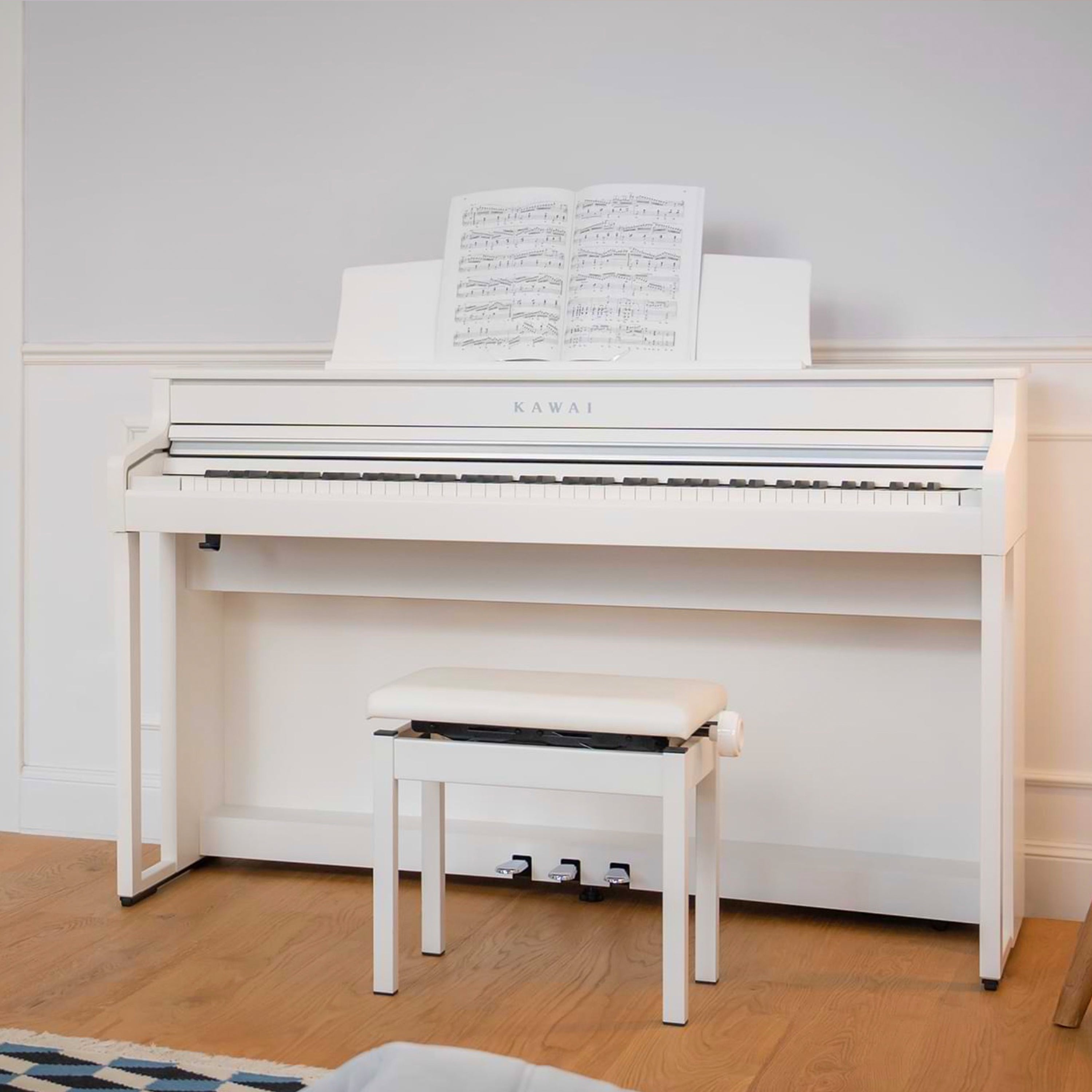Kawai CA501 Concert Artist Digital Piano - Satin White - Left angle in a living room