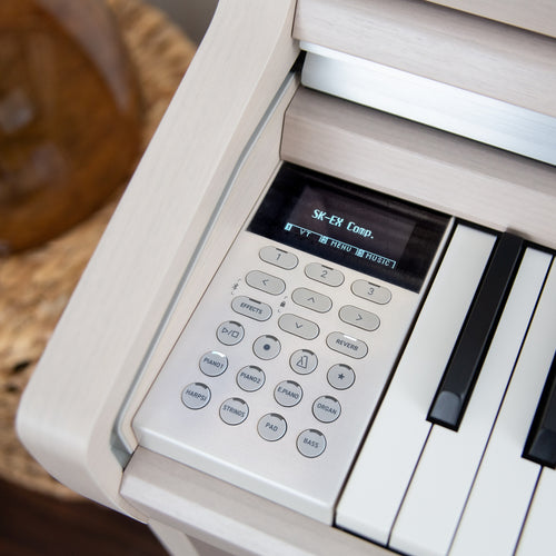 Close-up of a Kawai CA501 Concert Artist Digital Piano with control panel