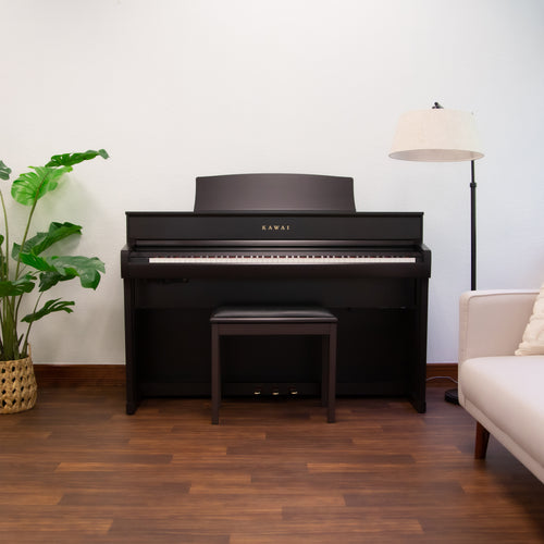 Kawai CA701 Digital Piano - Rosewood - front view in a stylish living room