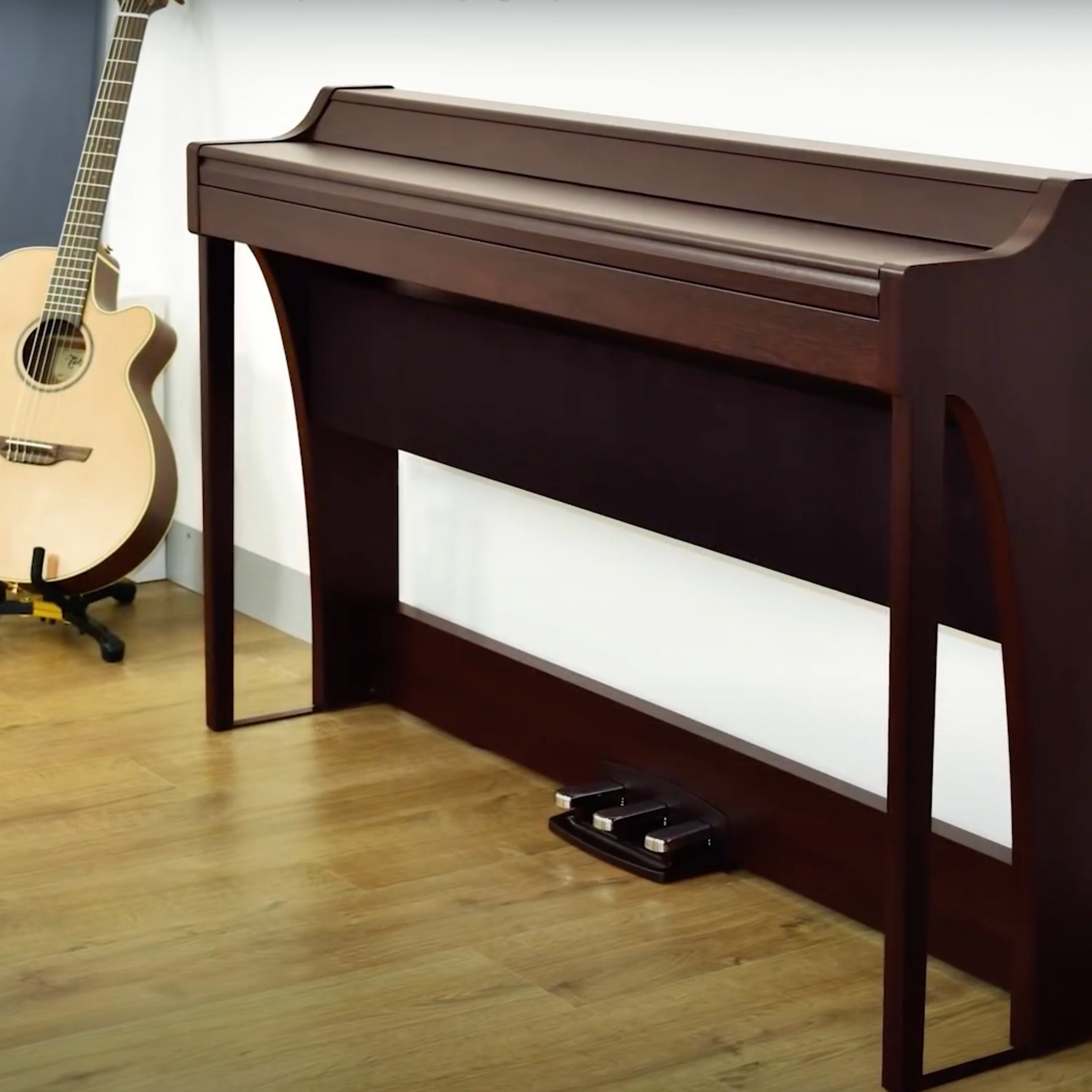 Korg G1B Air Digital Piano - Brown - with the key cover closed in a stylish living space