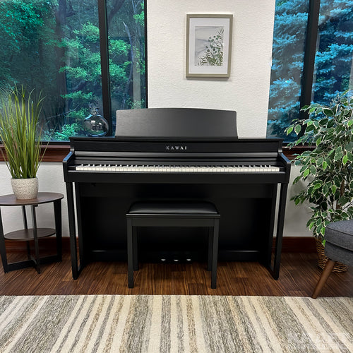 Kawai CA401 Concert Artist Digital Piano - Satin Black - Front view in a stylish living room