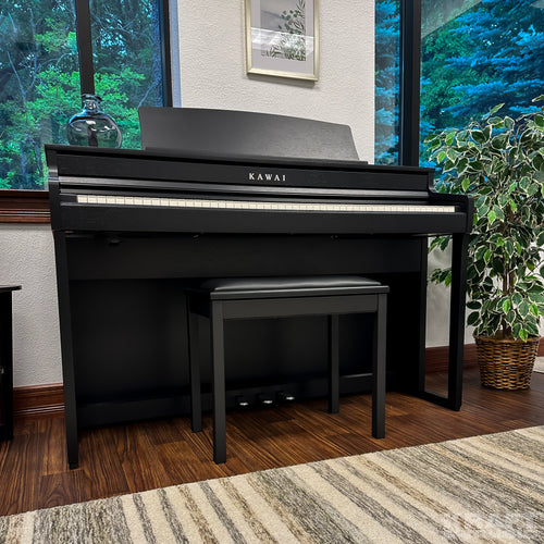 Kawai CA401 Concert Artist Digital Piano - Satin Black - Right angle from a low vantage point in a stylish living room