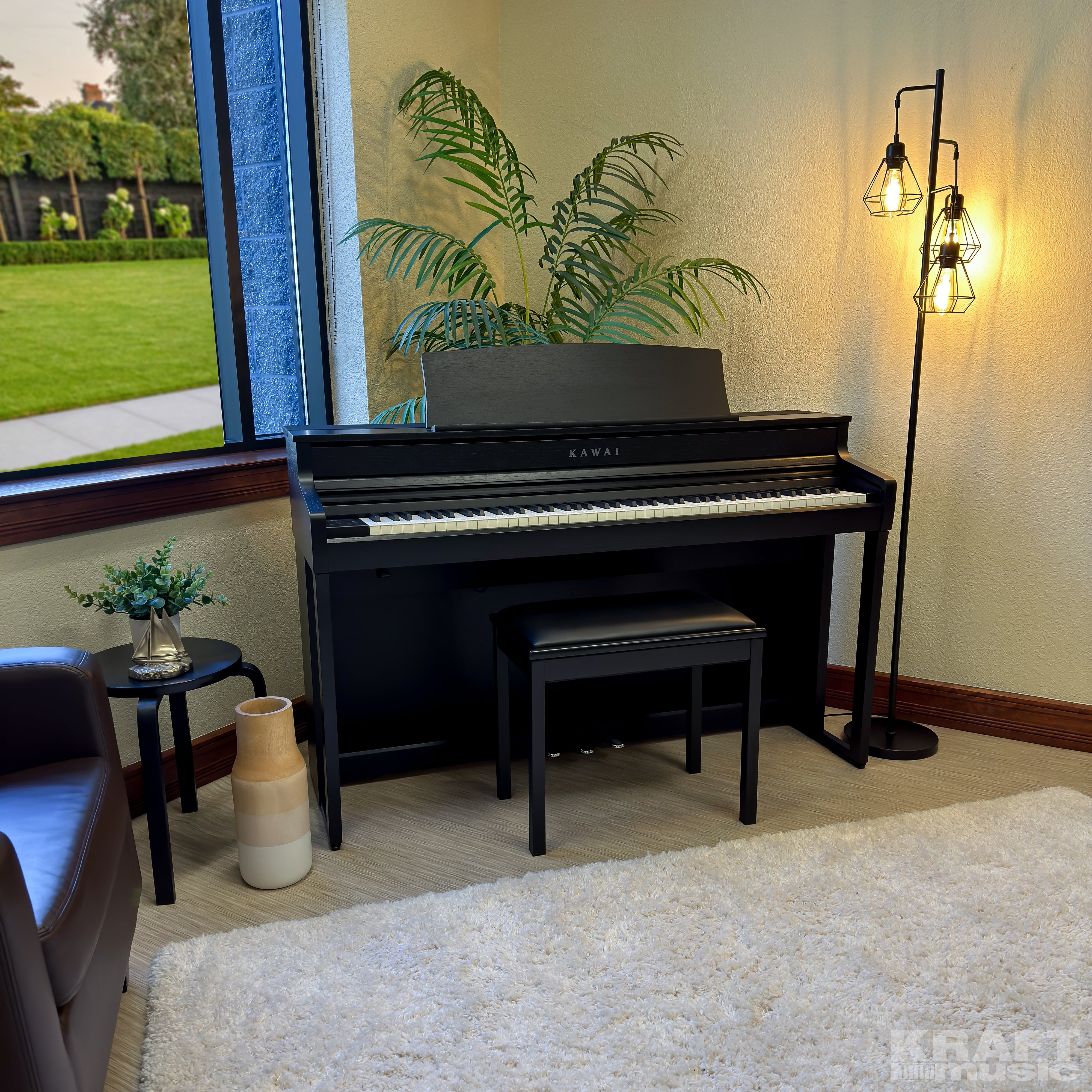 Kawai CA501 Concert Artist Digital Piano - Satin Black - in a stylish living room from the front