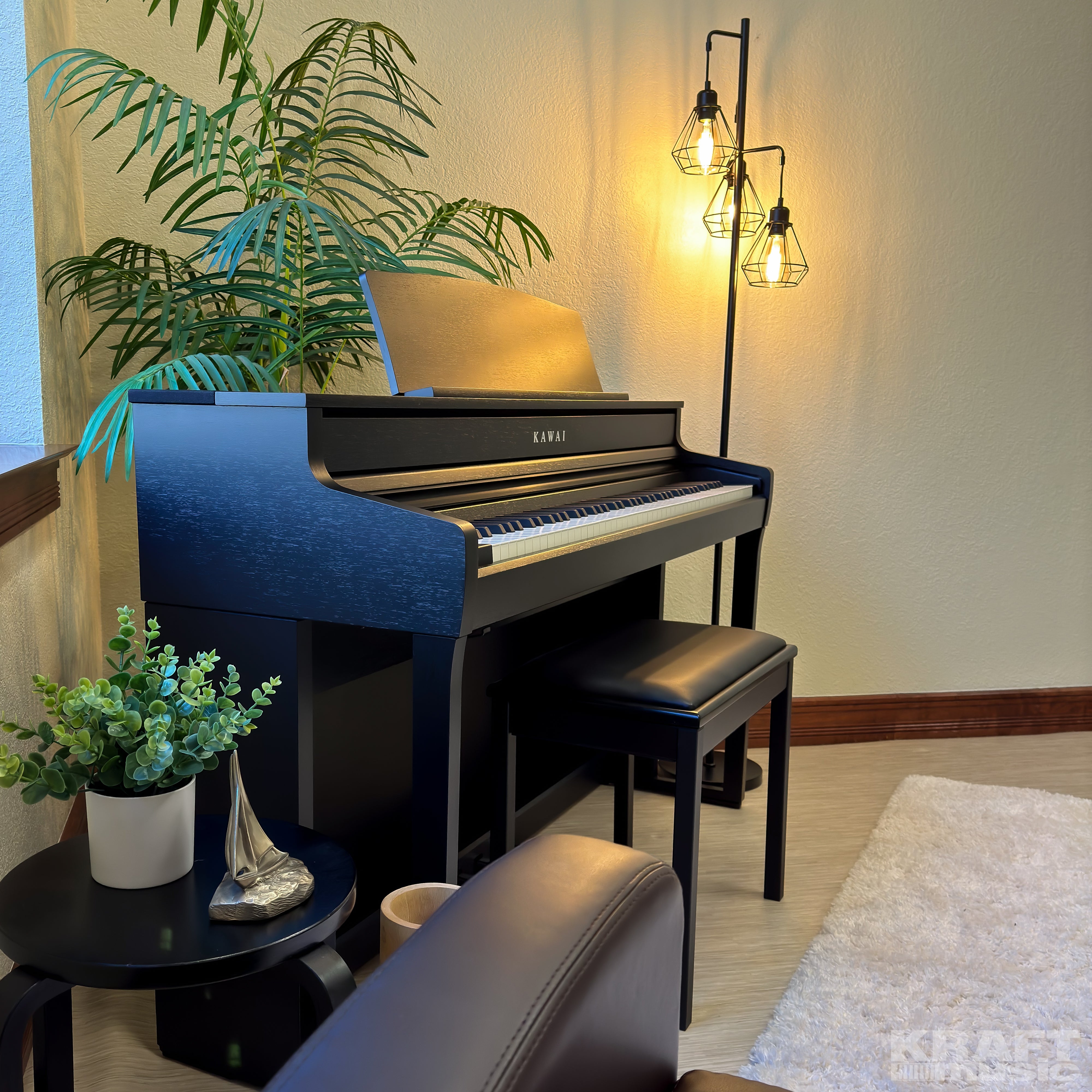 Kawai CA501 Concert Artist Digital Piano - Satin Black - in a stylish living room facing right
