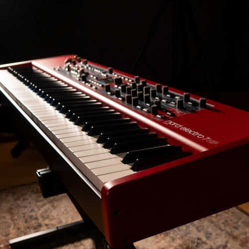 Nord Electro 7 HP 73 Stage Keyboard on a stand in a studio