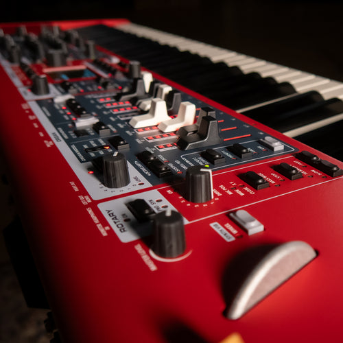 A close-up, angled view of a Nord Electro 7 showing its detailed control panel