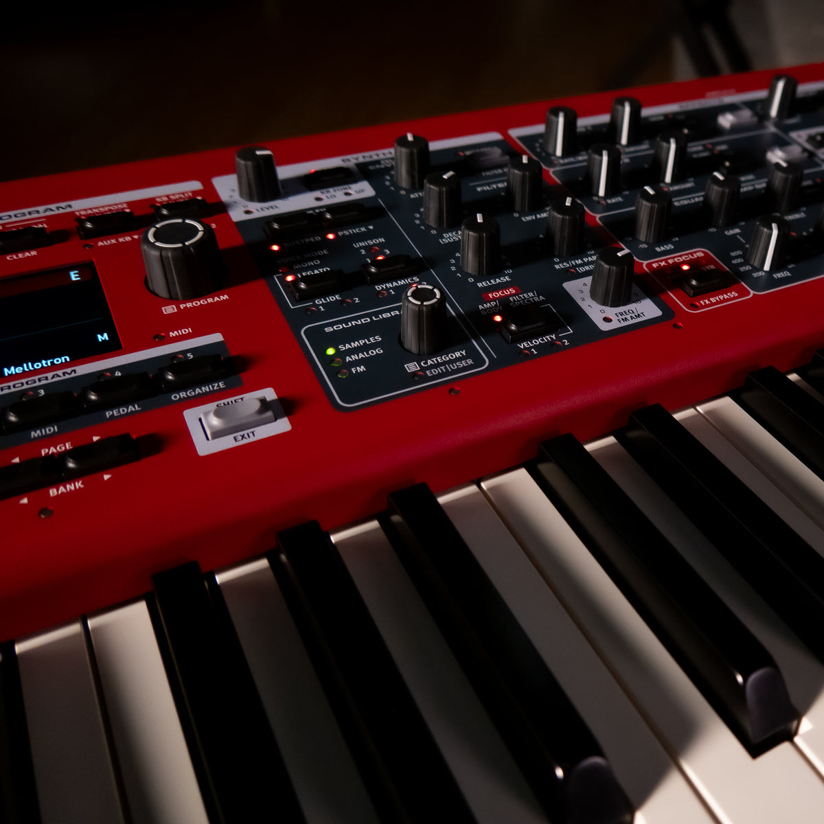 A close-up, angled view of a Nord Electro 7, featuring various black rotary knobs
