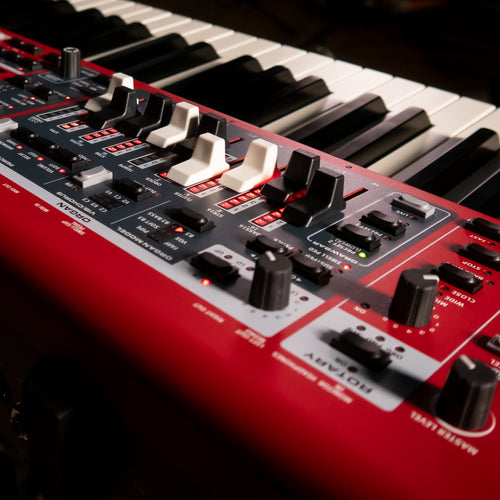A close-up angled view of a Nord Electro 7 with black and white keys