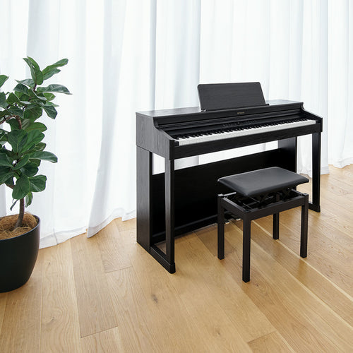 Roland RP701 Digital Piano - Contemporary Black - in a stylish living room