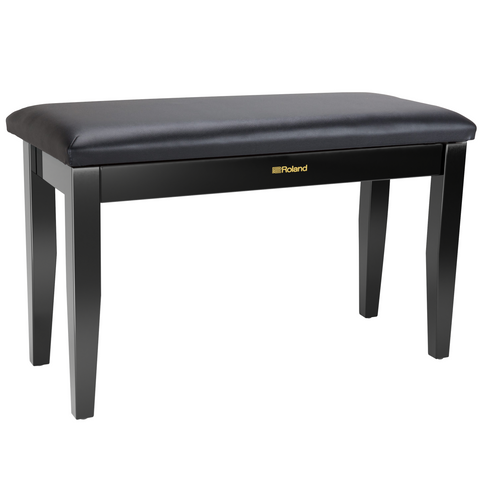 black duet piano bench with gold roland logo on a white background