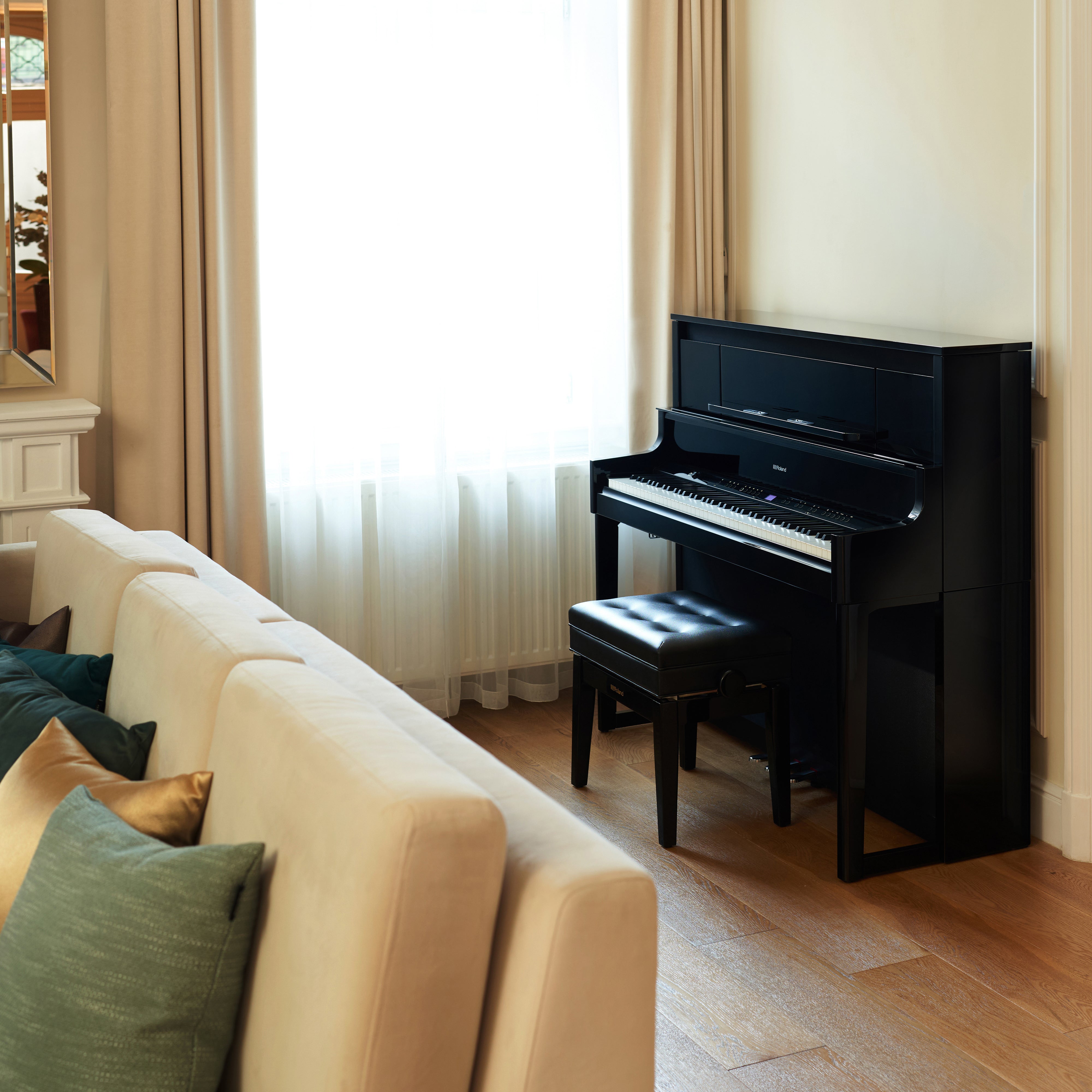 Roland LX-9 Digital Piano with Bench - Polished Ebony - in a stylish living room