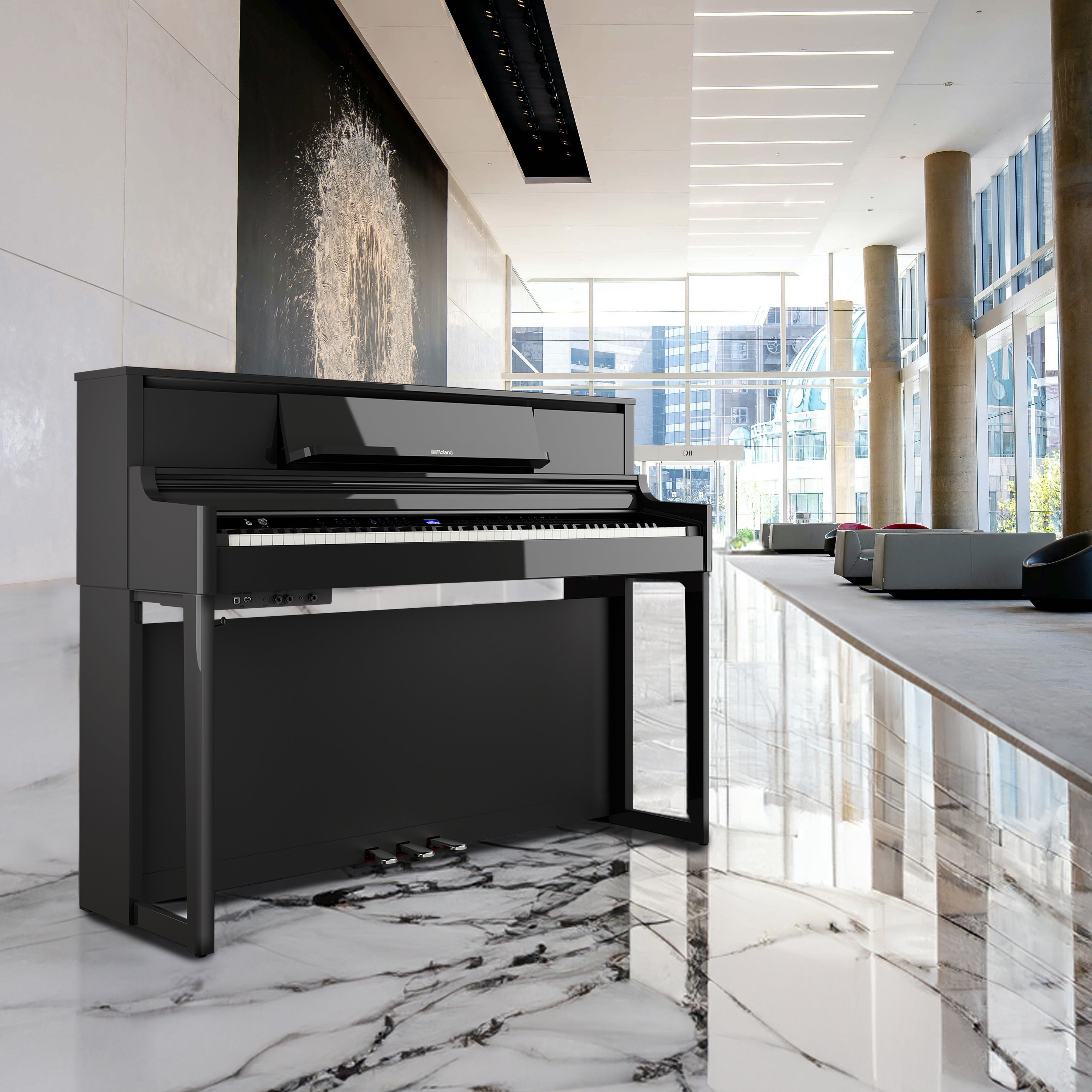 Roland LX-5 Digital Piano with Bench - Polished Ebony - in a fancy hotel lobby
