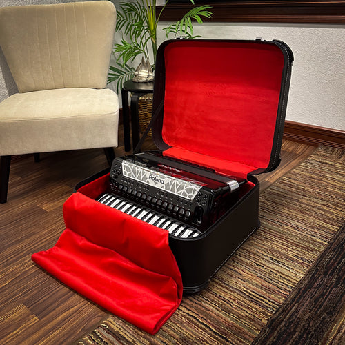 Alacran APC120STD Rolling Accordion Case with a Roland VAccordion in it, in a living space