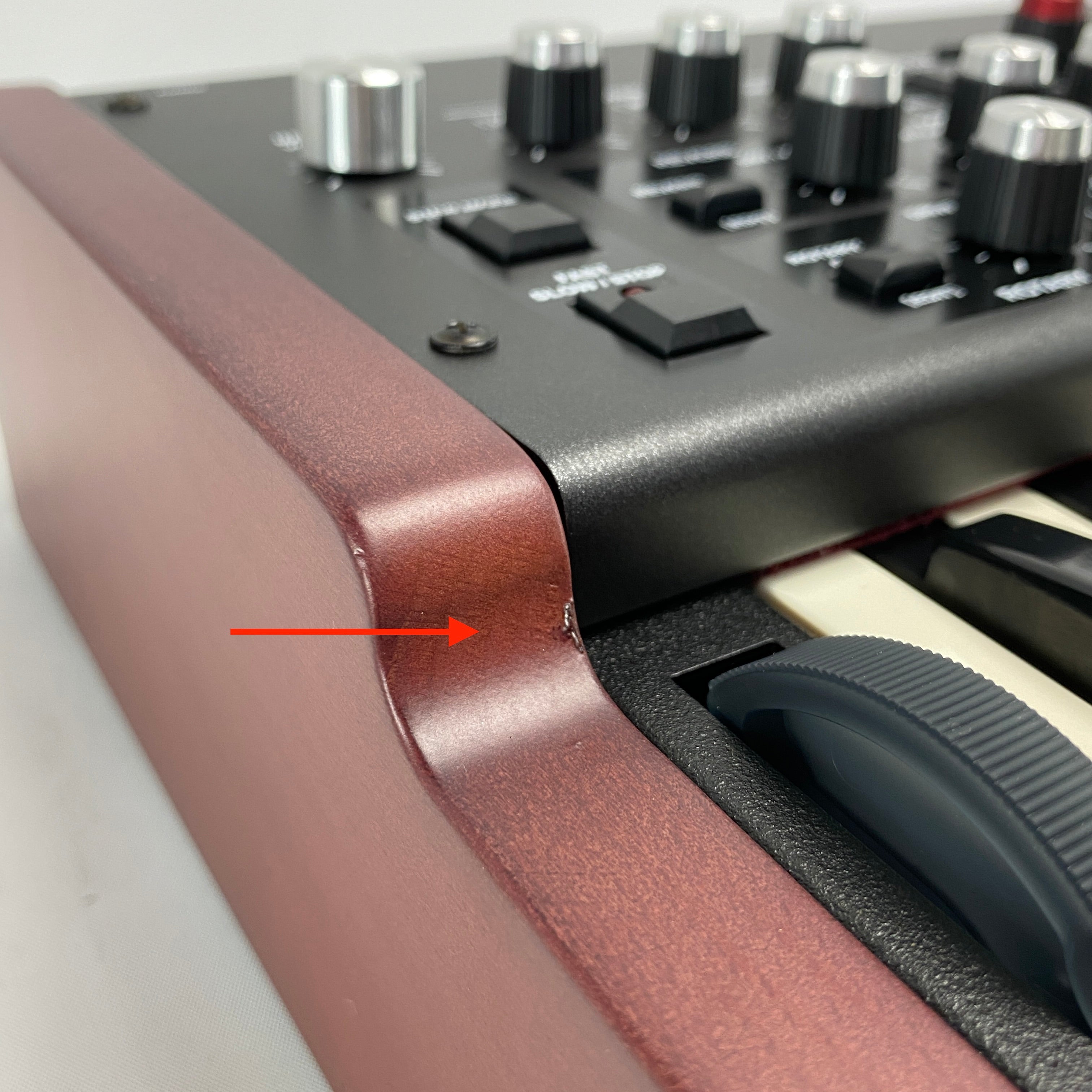 alternate angle of blemish in left side panel. 