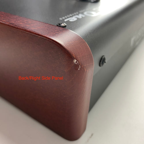 Close-up of the back of the right side panel of the Viscount Legend One, showing some chips and scratches to the finish of the instument. 