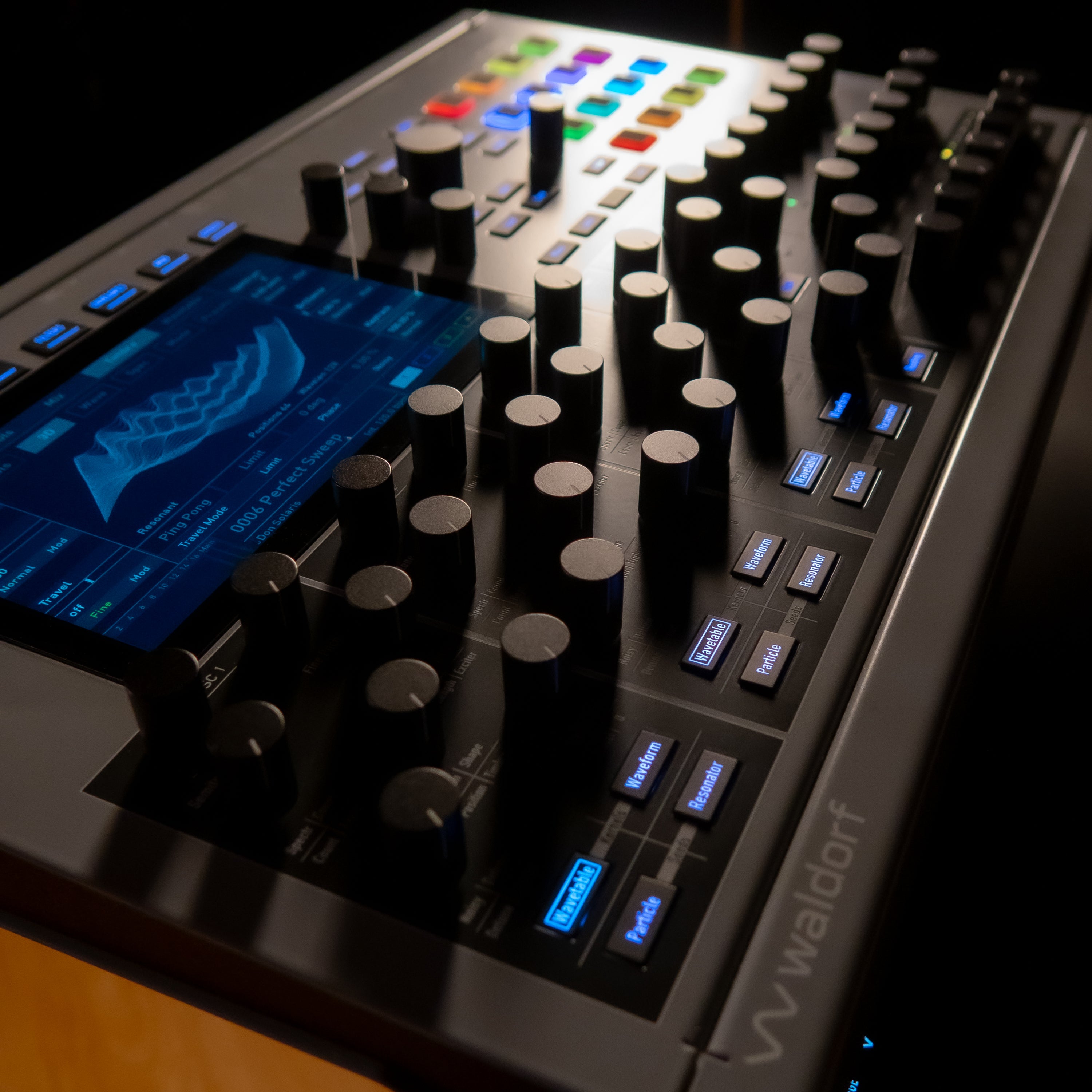 Waldorf Iridium MK2 on a stand in a dark lit studio
