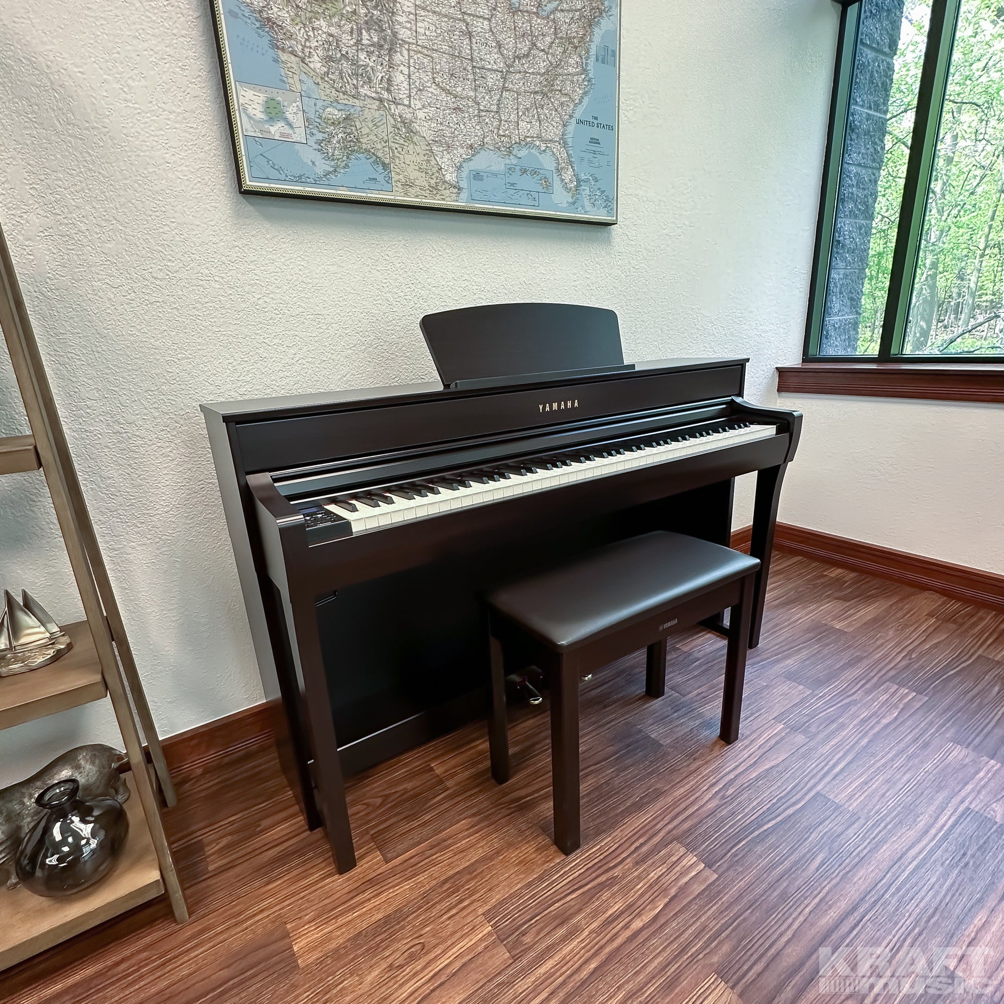 Yamaha Clavinova CLP-735 Digital Piano - Rosewood - right facing in a stylish room