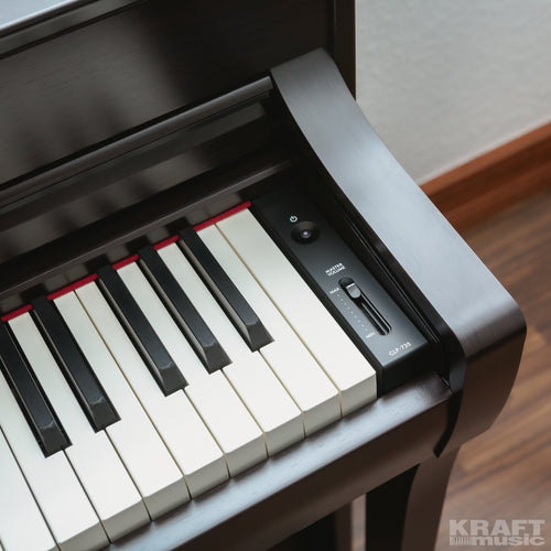 Yamaha Clavinova CLP-735 Digital Piano - Polished Ebony - power and volume controls