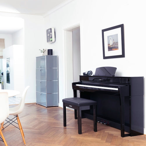 Yamaha Clavinova CLP-735 Digital Piano - Polished Ebony - in a stylish living space
