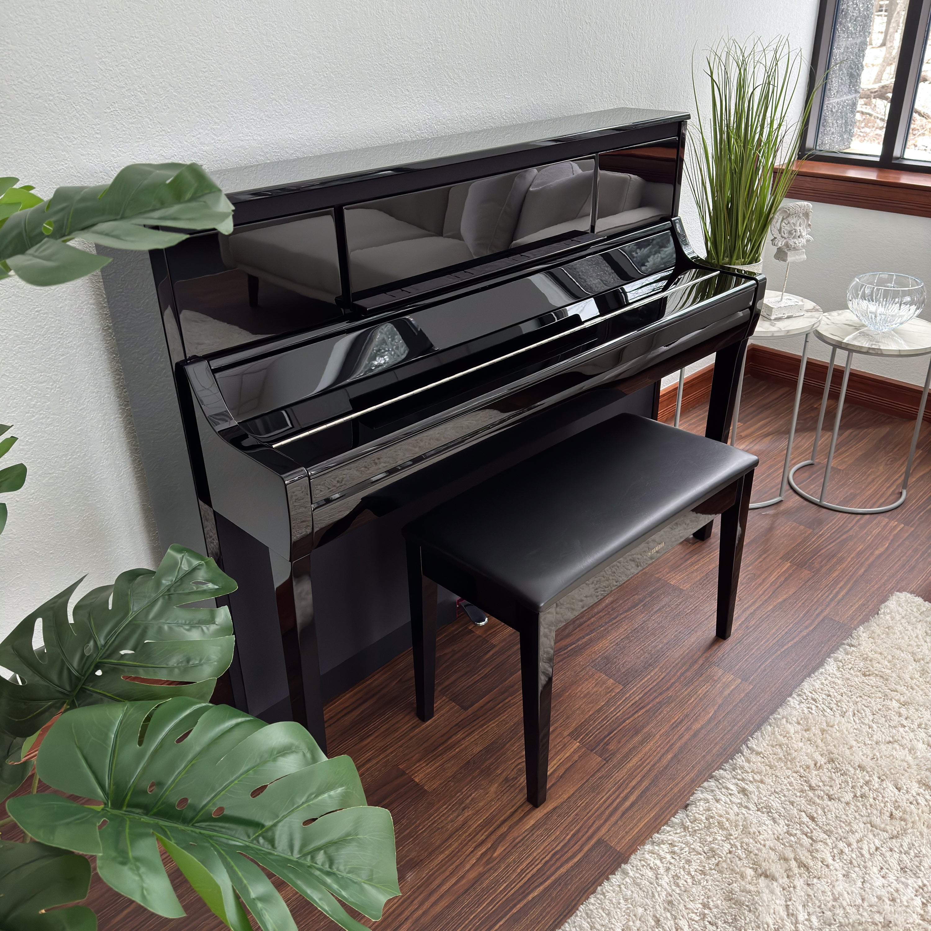 Yamaha Clavinova CSP-295 Digital Piano - Polished Ebony -  in a stylish living room with key cover closed
