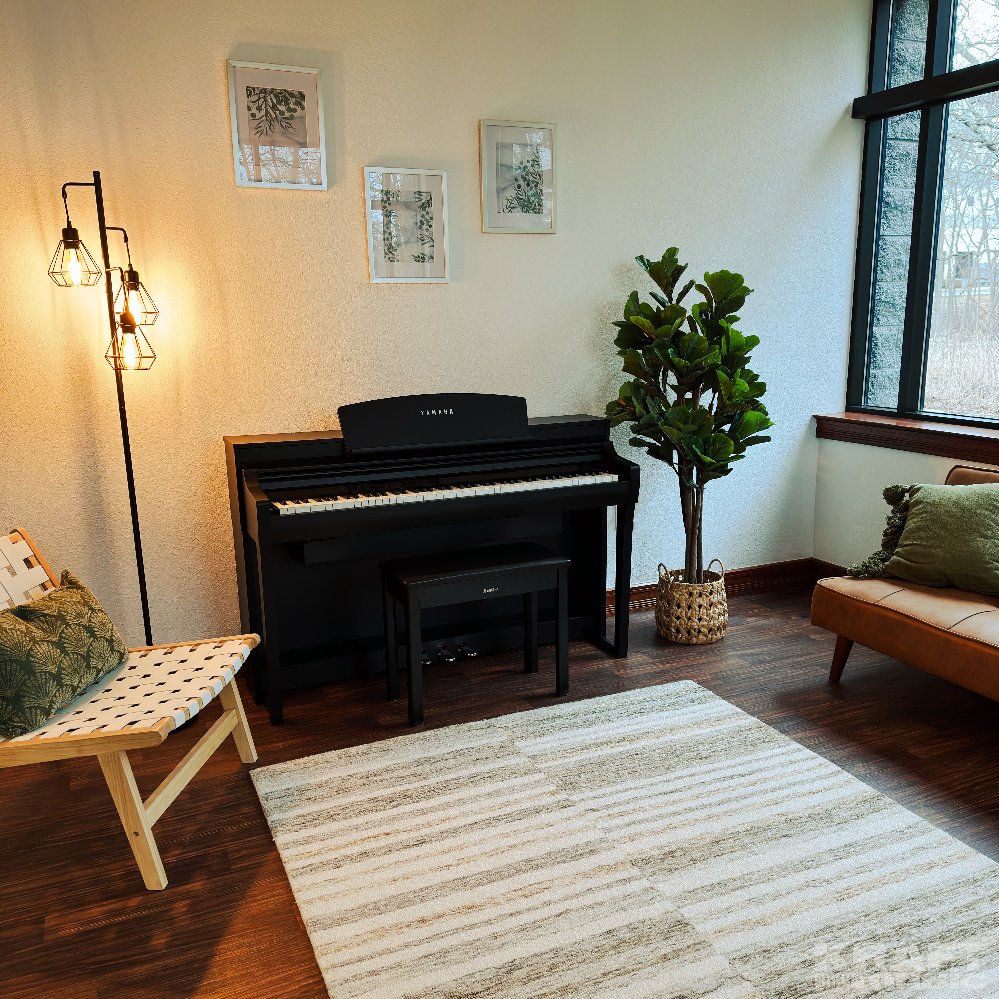 Yamaha Clavinova CSP-275 Digital Piano - Black Walnut - in a stylish living room 
