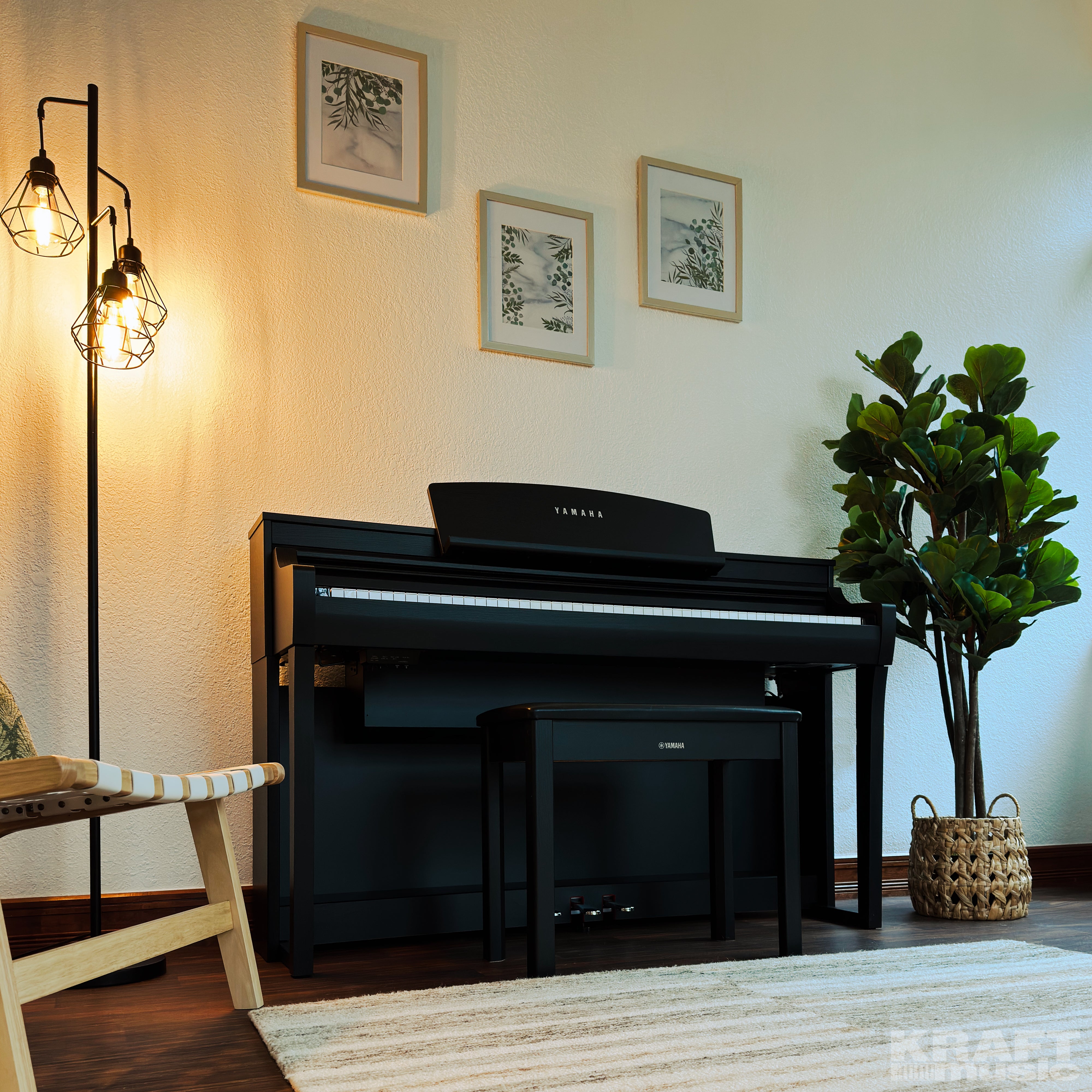Yamaha Clavinova CSP-275 Digital Piano - Black Walnut - in a stylish living room facing right from below