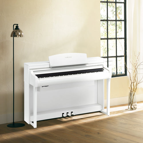 Yamaha Clavinova CSP-275 Digital Piano - Matte White - in a stylish living space