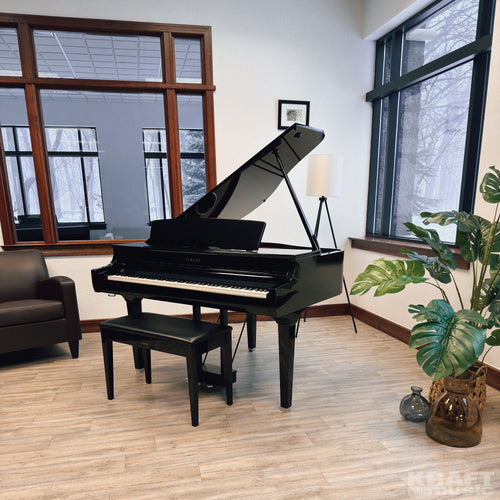 Yamaha Clavinova CSP-295GP Digital Grand Piano - Polished Ebony - in a stylish music room facing left