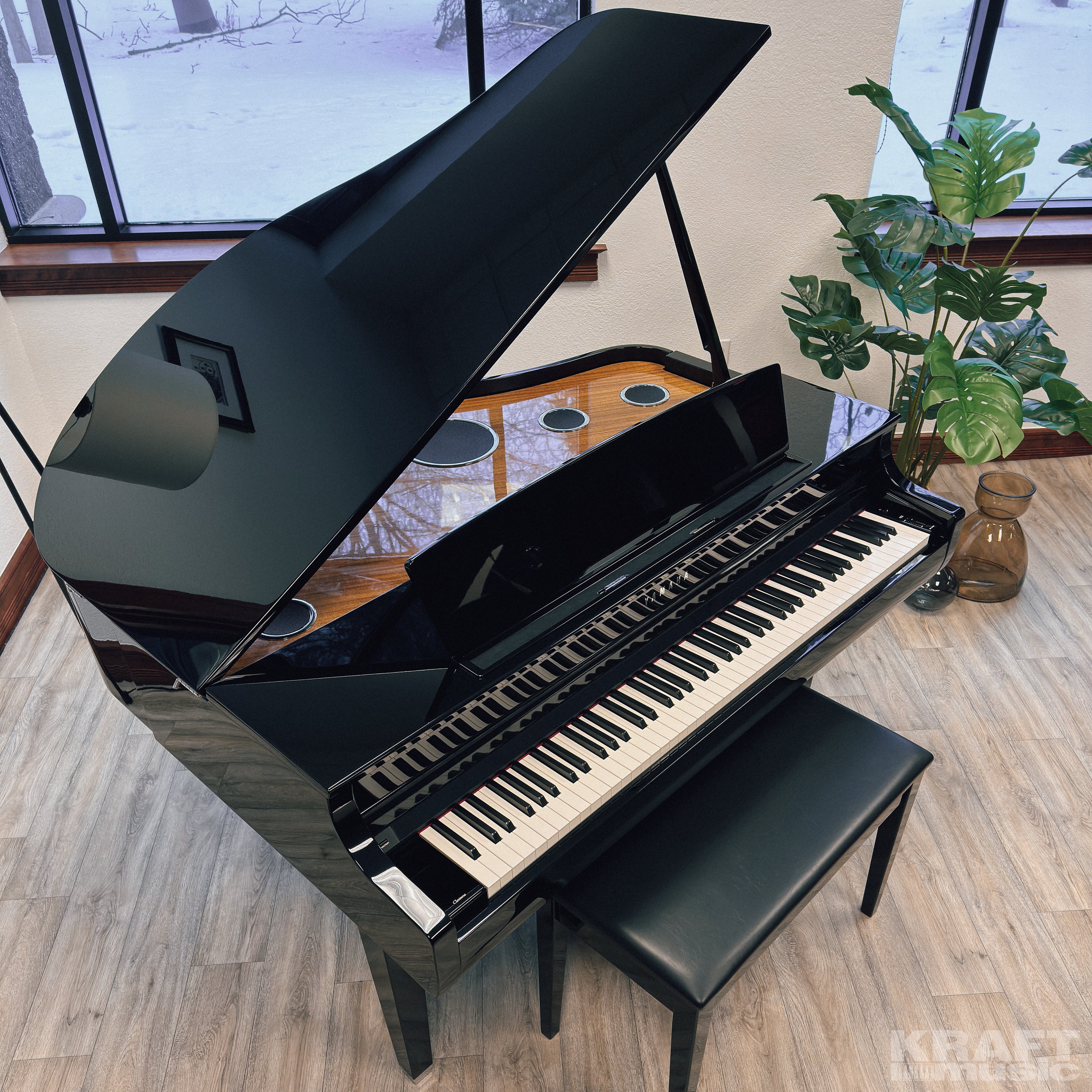 Yamaha Clavinova CSP-295GP Digital Grand Piano - Polished Ebony - in a stylish music room from above