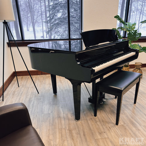 Yamaha Clavinova CSP-295GP Digital Grand Piano - Polished Ebony - in a stylish music room with lid closed