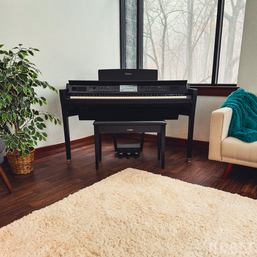 Yamaha Clavinova CVP-909 Digital Piano - Matte Black - in a stylish living room facing front