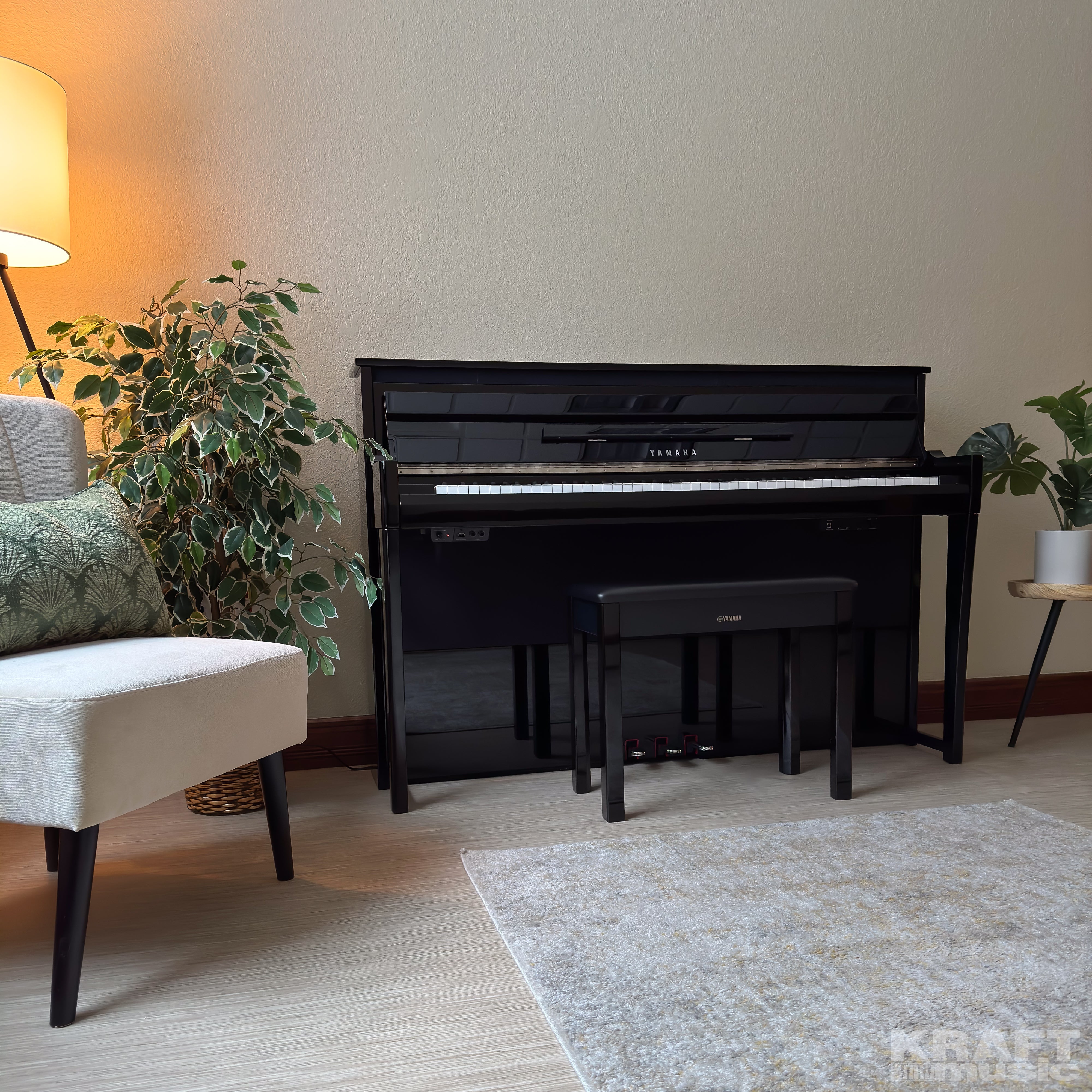 Yamaha AvantGrand NU1XA Hybrid Piano - Polished Ebony - right facing in a stylish living space