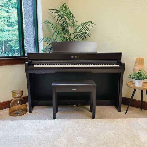 Yamaha Clavinova CLP-745 Digital Piano - Rosewood - front view in a stylish living space