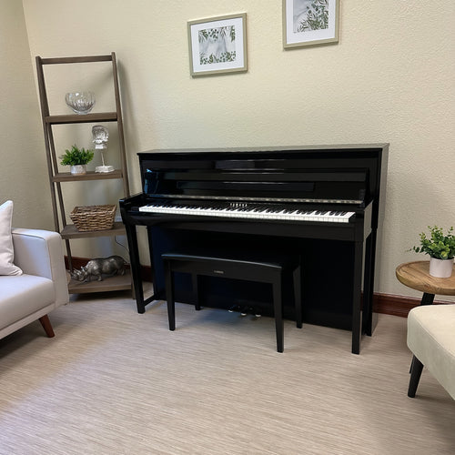 Yamaha Clavinova CLP-785 Digital Piano - Polished Ebony - in a stylish living room