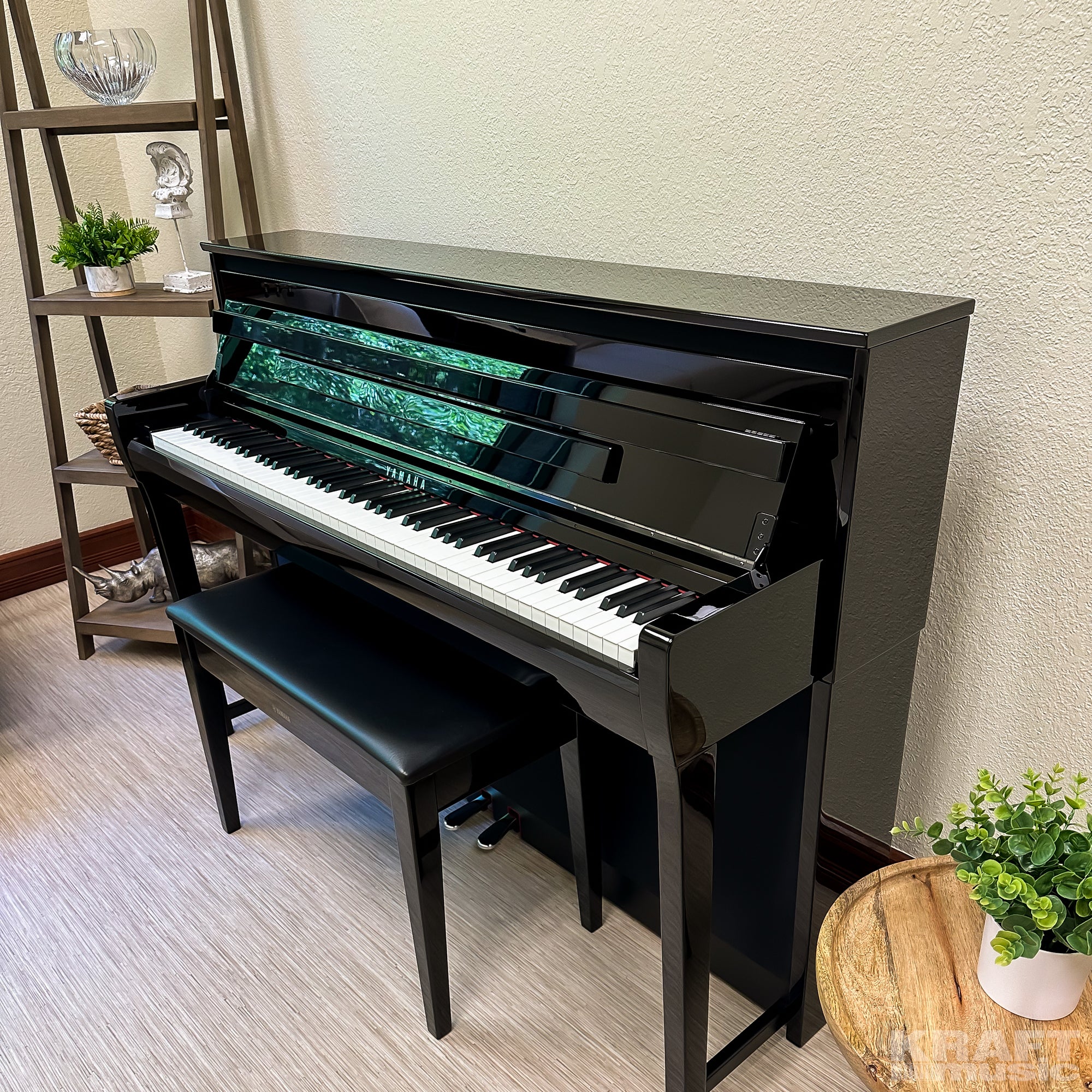 Yamaha Clavinova CLP-785 Digital Piano - Polished Ebony - in a stylish living room facing left