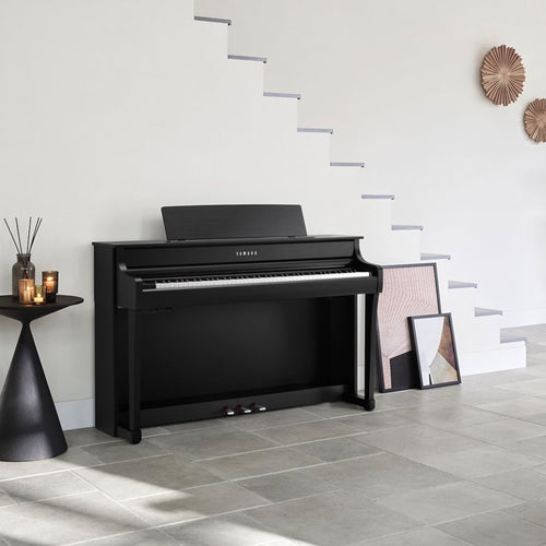 Yamaha Clavinova CLP-845 Digital Piano - Matte Black in a stylish room