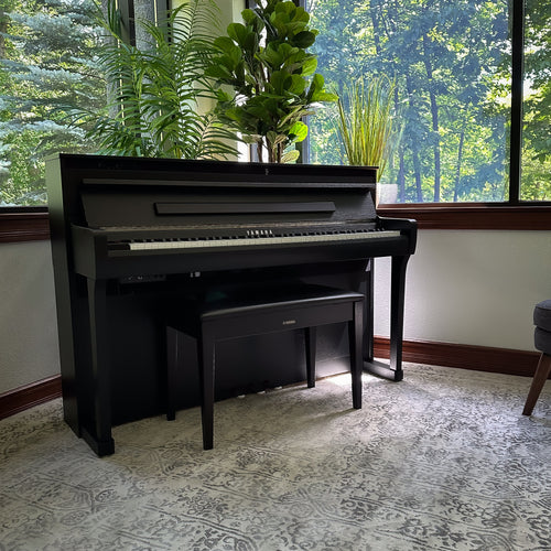 Yamaha Clavinova CLP-885 Digital Piano - Matte Black in a stylish room, view 2